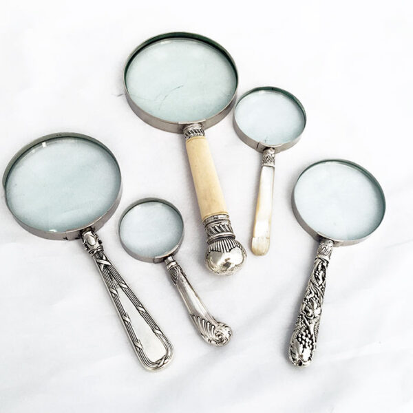 MAGNIFYING GLASSES