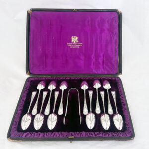 TWELVE VICTORIAN SILVER TEA SPOONS