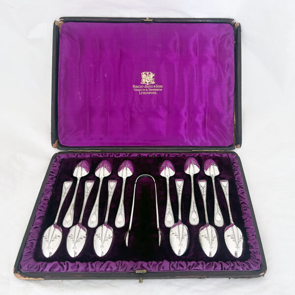TWELVE VICTORIAN SILVER TEA SPOONS
